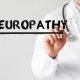 Doctor writing the word neuropathy